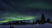 Watching a night sky with aurora borealis